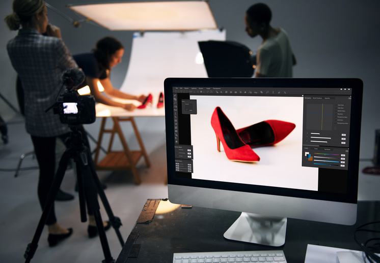 photographers taking pictures of shoes to use for online marketing