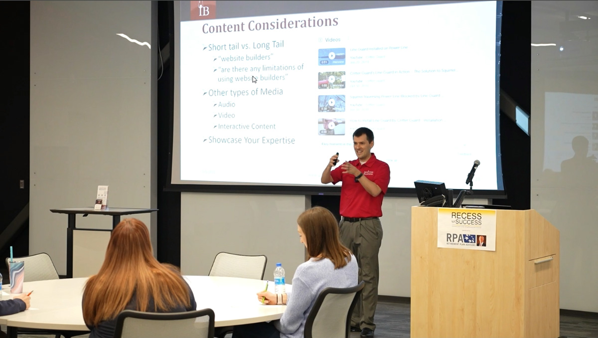 team member teaching at a local conference